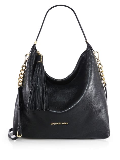 black leather bag michael kors|michael kors black shoulder handbags.